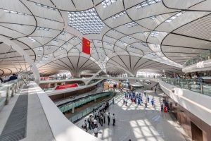 BEIJING, CHINA - AUGUST 30: (Image taken with fisheye lens) Simulated passengers participate in the fifth comprehensive drill at Beijing Daxing International Airport on August 30, 2019 in Beijing, China. 8,868 simulated passengers and 140 flights participate in the fifth comprehensive drill at Beijing Daxing International Airport on August 30. The airport is scheduled to operate at the end of September in Beijing. (Photo by Chen Xiao/VCG via Getty Images)